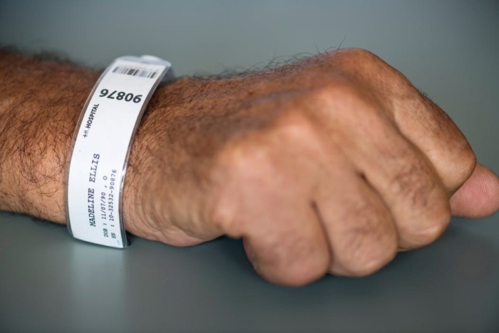 arm with hospital ID bracelet